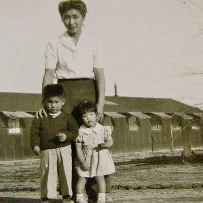 Satsuki Ina as a toddler with her mother and brother.