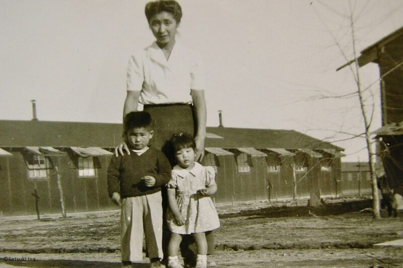 Satsuki Ina as a toddler with her mother and brother.