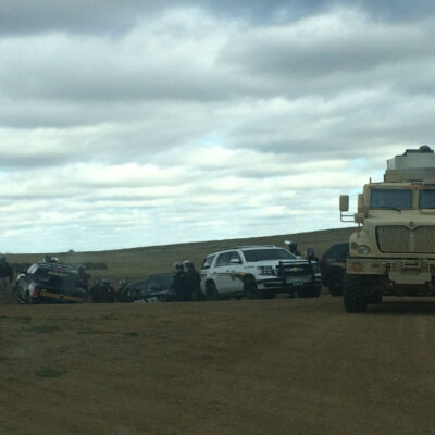 Police car and military vehicle roadblock in Morton County, North Dakota