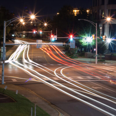 Photo of blurred car light trails at night