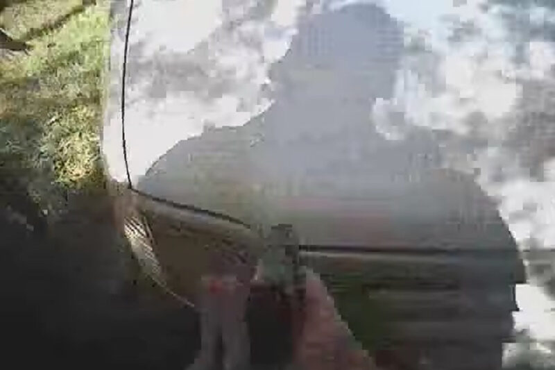 A Charlotte police officer's shadow is captured by his body camera just before Keith Scott shooting