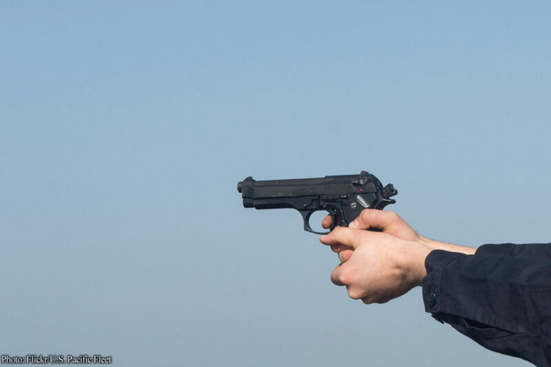 Picture of a gun in a man's hands