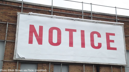 Large billboard reading "notice"