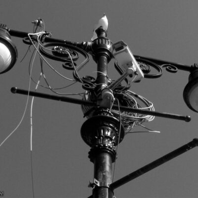 Eye-like streetlights with camera and wires attached