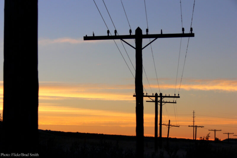 Old telephone lines at dawn