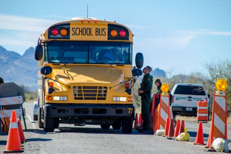 Border Patrol stops school bus at a checkpoint.