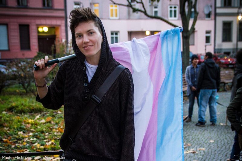 Young person with flag at Trans March Berlin 2014