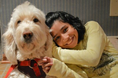 Ehlena Fry and her service dog, Wonder