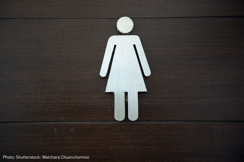 Women's room sign