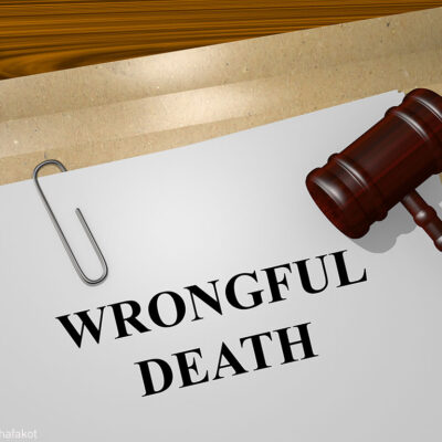 File with "Wrongful Death" printed on it and judge's gavel