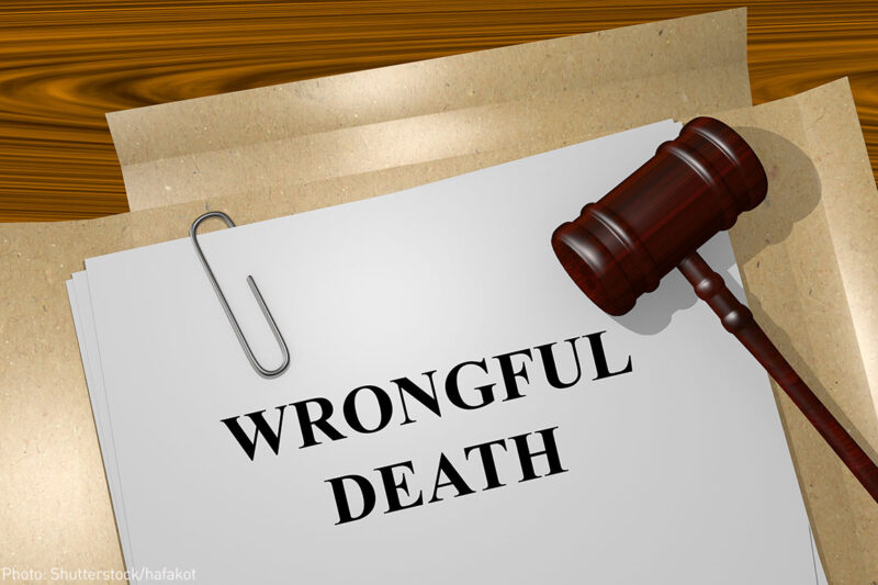 File with "Wrongful Death" printed on it and judge's gavel