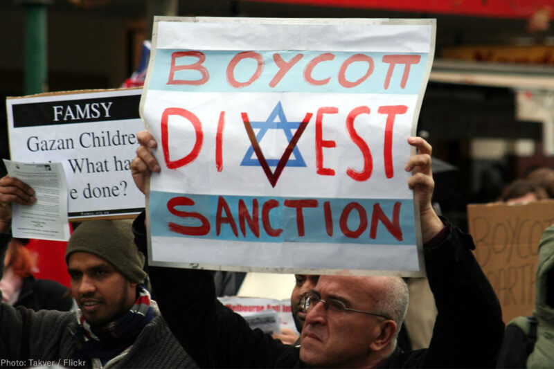 Boycott Divest Sanction Sign at Protest