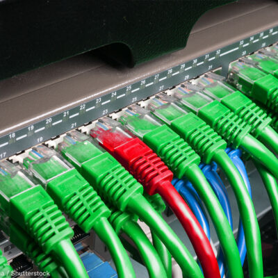 Server rack with green and red wires