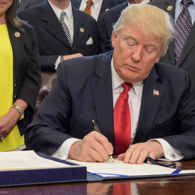 Trump Signing Paper