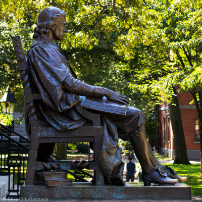 Statue of John Harvard on Harvard University's campus