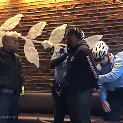 Police arrest a Black man waiting in a Starbucks