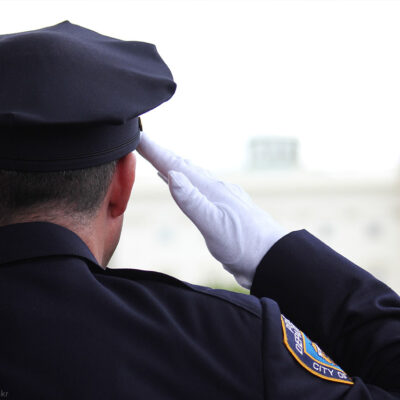 Police officer saluting