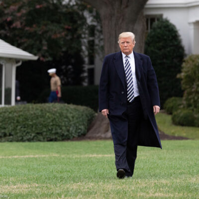 Trump walking on the White House Lawn
