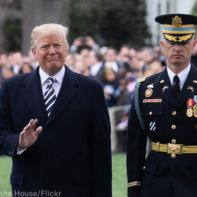 Trump and a member of the military