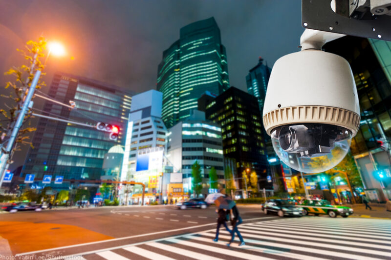 Surveillance camera on a city street at night