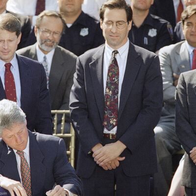 President Bill Clinton signs the $30 billion crime bill during a ceremony on the South Lawn of the White House in Washington on Sept. 13, 1994