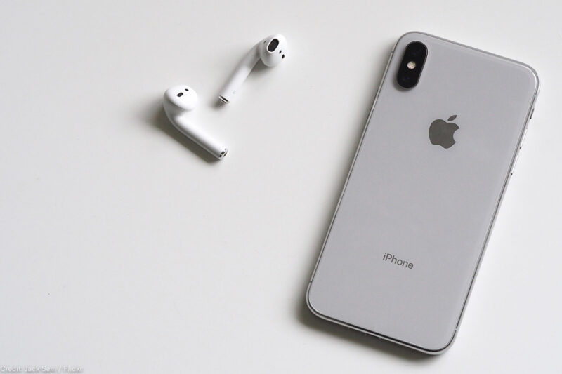 Back of iPhone with pair of Airpods