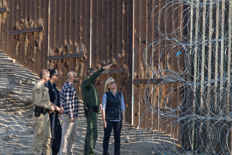 Secretary of Homeland Security Kirstjen M. Nielsen near the border fence at Border Field State Park