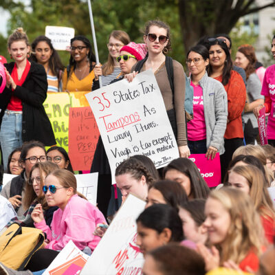 Menstrual activists demonstrate at the Capitol during a National Period Day rally.