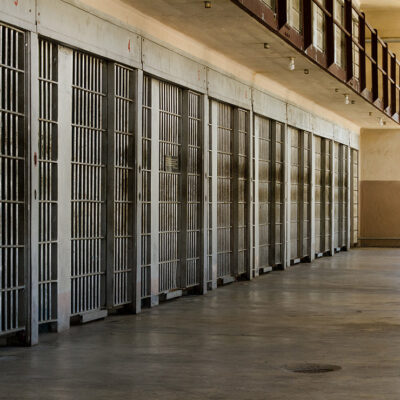 An image of empty prison cells. Are prisons ready for the ensuing COVID-19 pandemic?