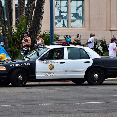San Diego Police car on the street during the day.
