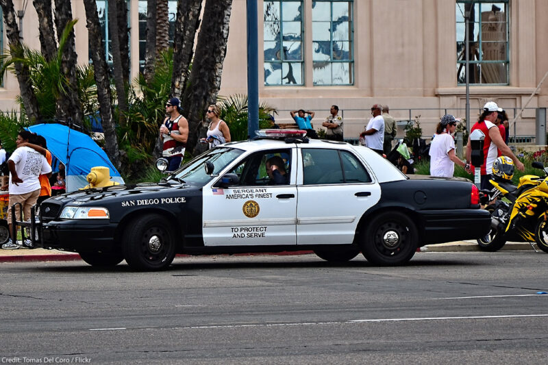 San Diego Police car on the street during the day.