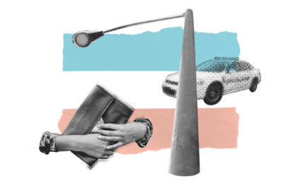 Two hands holding a purse near a street lamp and police car on a background with the trans flag colors.