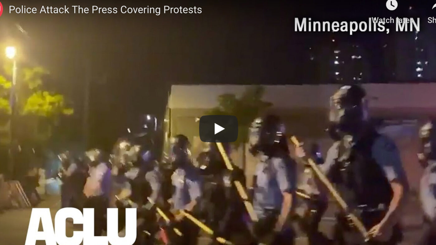 Police carrying batons in the streets in Minneapolis, Minnesota.