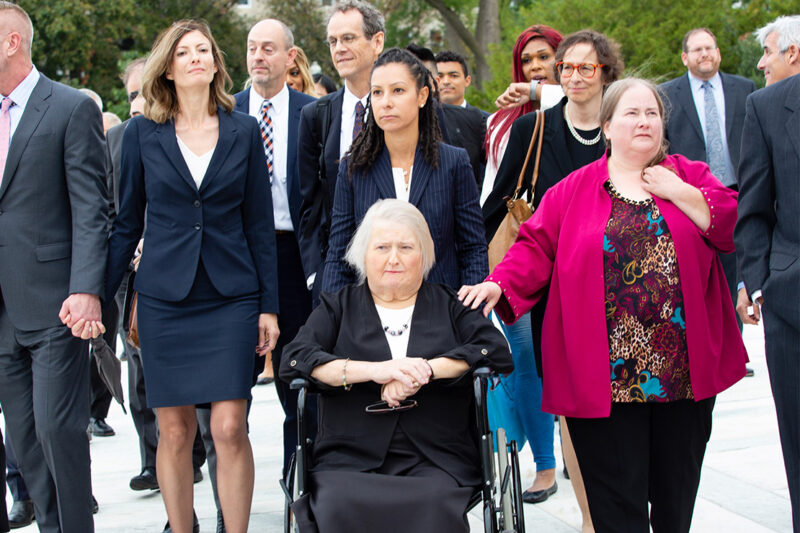 Aimee Stephens with her wife and legal team outside the Supreme Court.