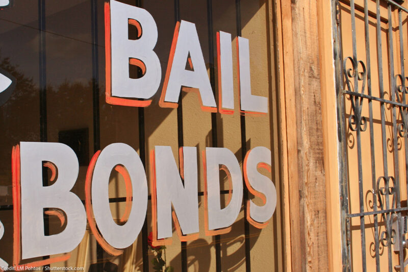 Window sign reads "bail bonds"