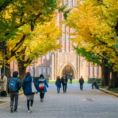 Students walking on a college campus.