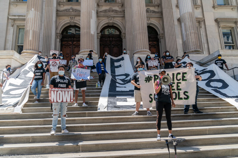 Protesters demanding removing police officers from schools on steps of Department of Education in Manhattan, New York.