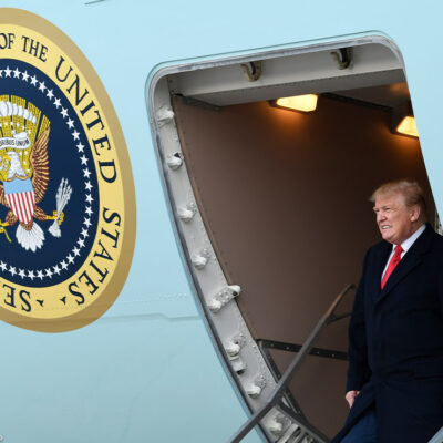 President Donald Trump walks down the steps of Air Force One at Andrews Air Force Base in Maryland.