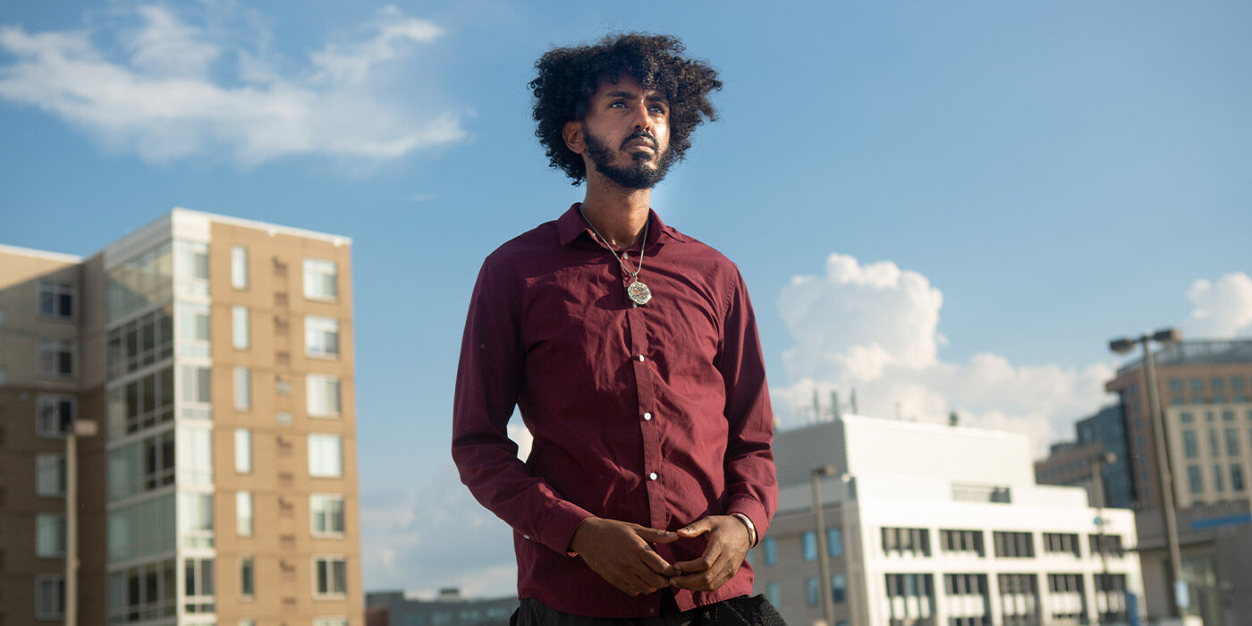 Photo of Nahom, a refugee and lawful permanent resident, originally from Eritrea.
