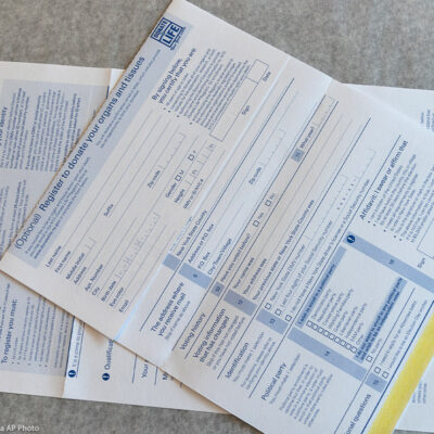 Photo from above of New York State Voter registration forms