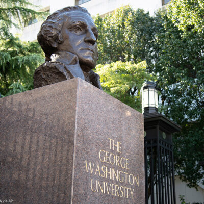 A bust of George Washington at a gate at The George Washington University (GWU) campus in Washington, D.C.