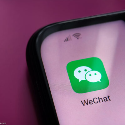 WeChat app shown on iPhone screen.