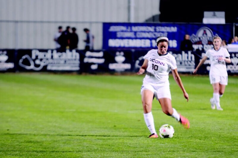 UCONN Soccer player and author Noriana Radwan is seen on the soccer pitch.