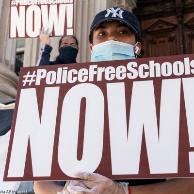 Protesters demanding removing police officers from schools on steps of Department of Education know as Tweed Courthouse in New York on June 25, 2020.