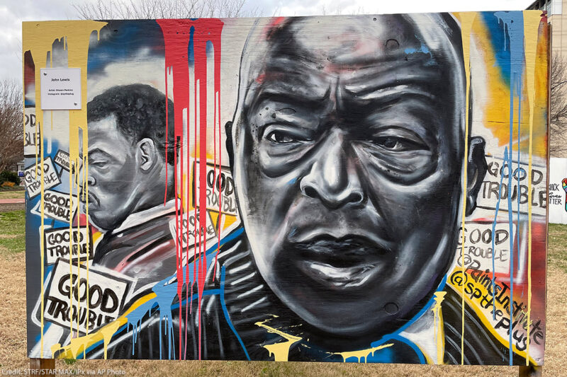 John Lewis painted on a mural in Washington, DC