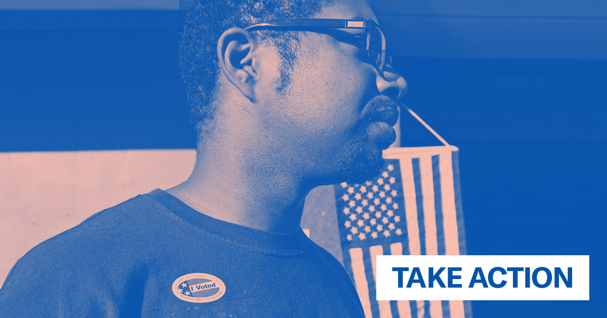 Image for Voting Rights Action, a black man standing with "I Voted" sticker on shirt