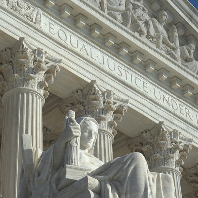 "Equal Justice Under Law" engraving above entrance to US Supreme Court Building.