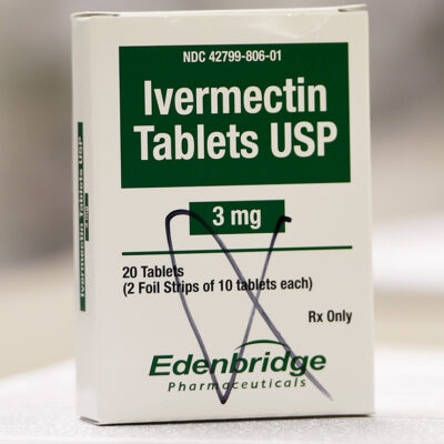 A box of ivermectin is shown in a pharmacy.