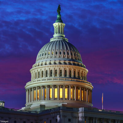 A vividly colored sky behind Capitol Hill in Washington D.C.