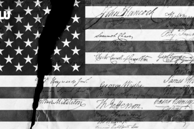 A black and white graphic of an American flag with a rip through it.